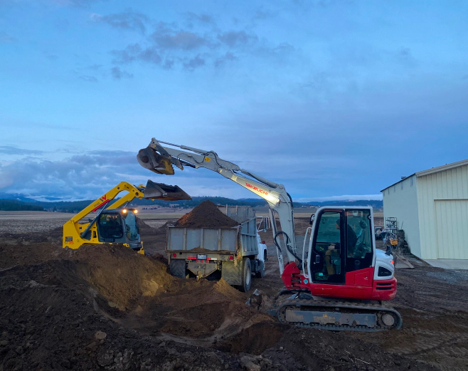 excavators and dump truck doing ground work mead wa